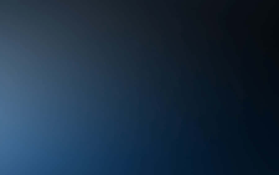 A Stunning Dark Blue Gradient Wallpaper Wallpaper