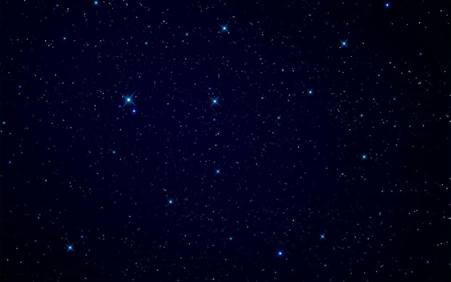_ A Vibrant Blue Star Shines Brightly In The Night Sky._ Wallpaper