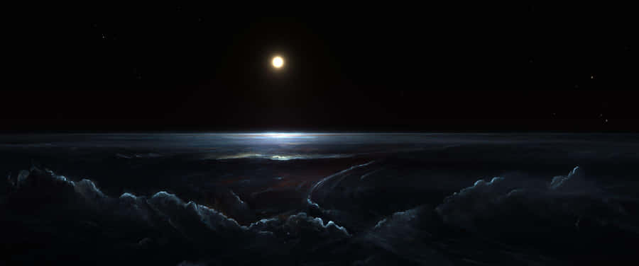 A Vibrant Landscape Of A River Winding Through Snow-covered Mountains. Wallpaper