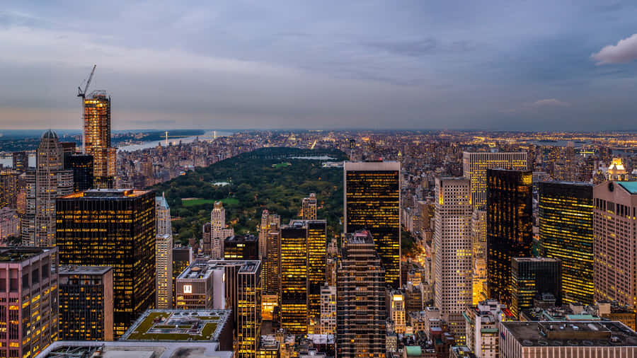 A View Of The City From The Top Of A Building Wallpaper