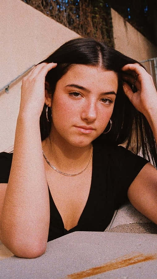 A Woman With Long Hair Wallpaper