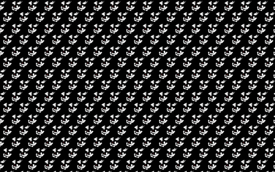 A Young Boy Using A Computer Wallpaper