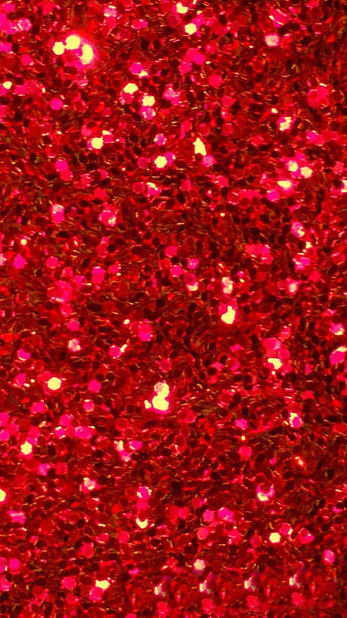 Add A Touch Of Sparkle To Your Life With Red Glitter Wallpaper