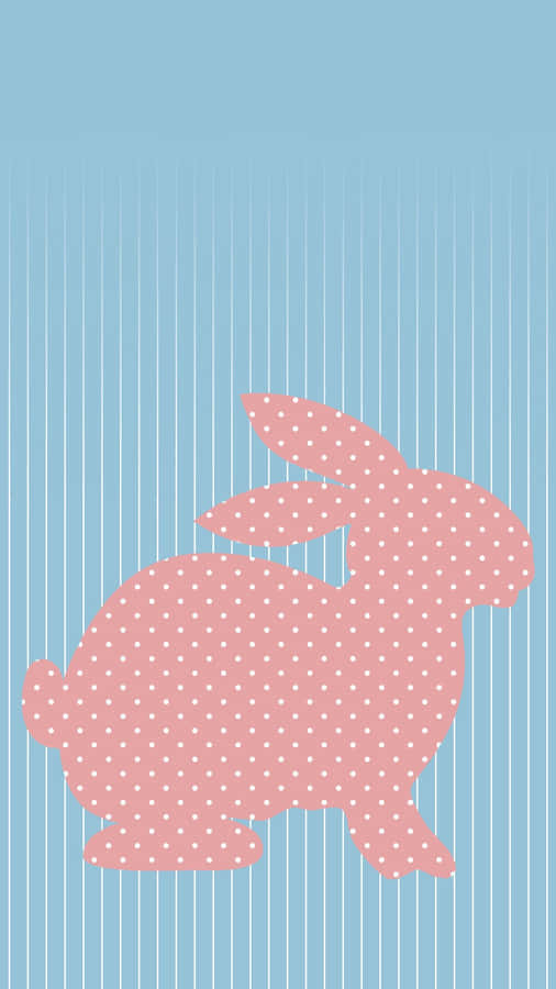 Adorable Pink Bunny Hopping Through A Grassy Meadow Wallpaper