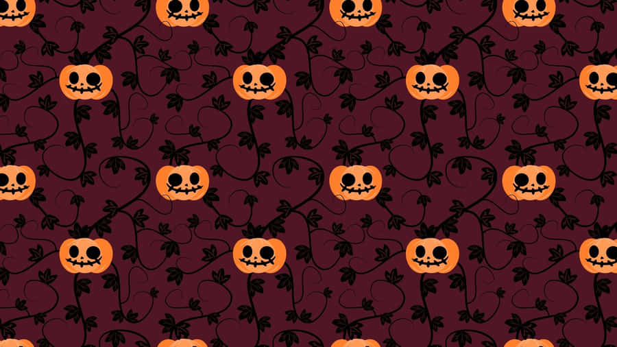 Adorable Smiling Jack-o'-lantern In A Fall Harvest Scene Wallpaper