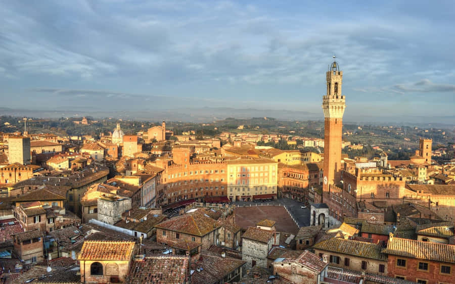 Aerial View Of Brick Buildings In Siena Wallpaper