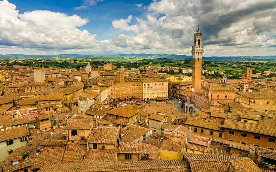 Aerial View Of Brick Houses In Siena Wallpaper