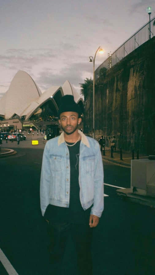 Aesthetic Rapper Poised For A Performance Wallpaper