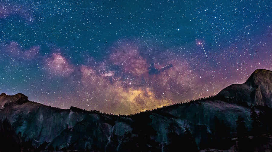 Aesthetic Stars Over The Mountain Laptop Wallpaper