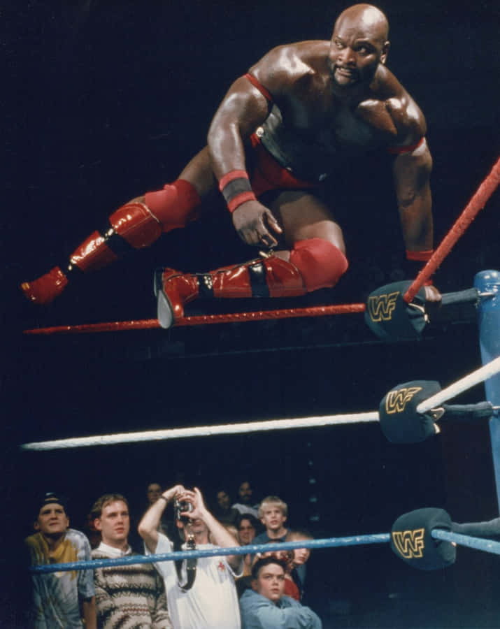 Ahmed Johnson, The Powerhouse Wrestler In Action Wallpaper