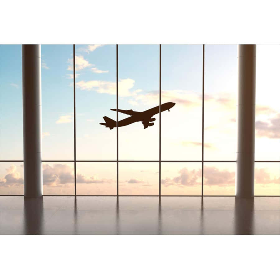 Airplane Climbing After Departure From The Terminal Wallpaper