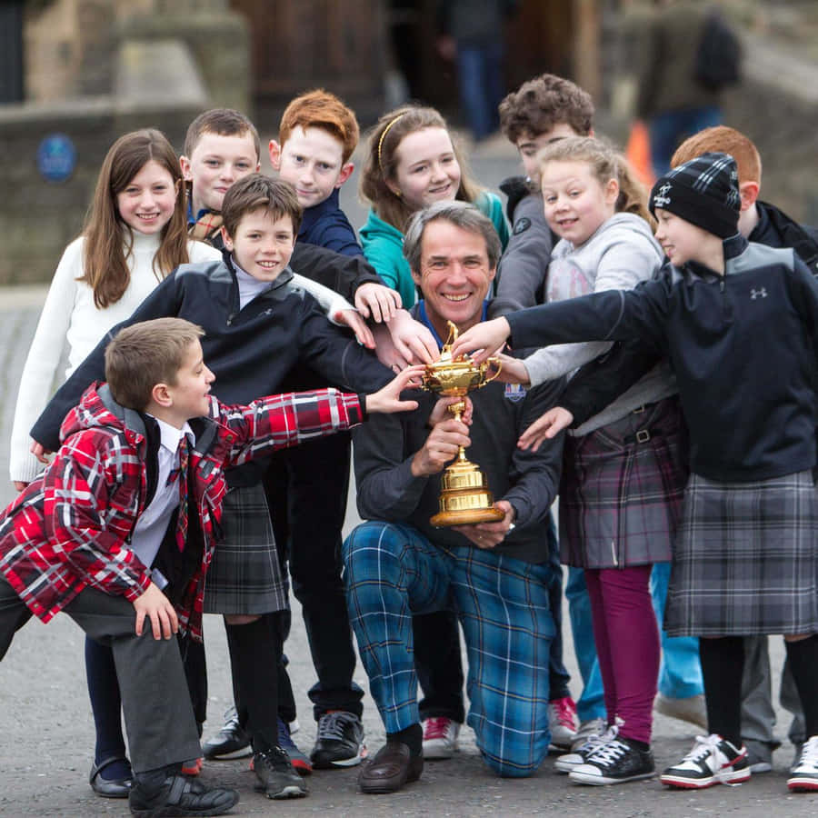 Alan Hansen Photo Op With Kids 2014 Wallpaper