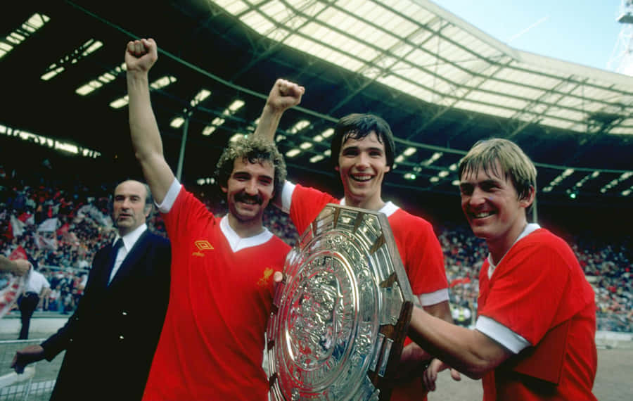 Alan Hansen With Charity Shield Match Trophy 1979 Wallpaper