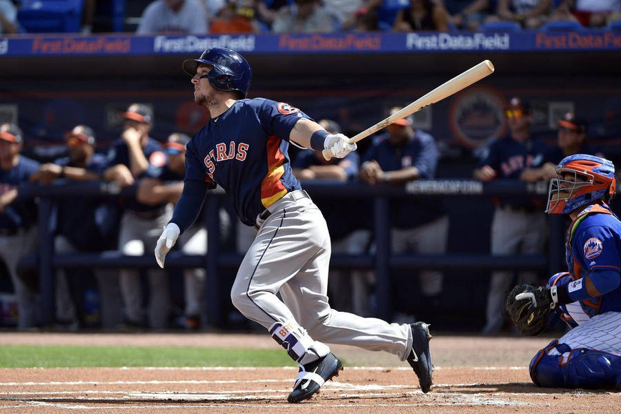 Alex Bregman Running While Holding Bat Wallpaper