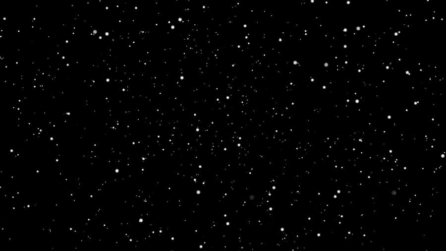 An Aesthetic Star Laptop On A Desk Wallpaper