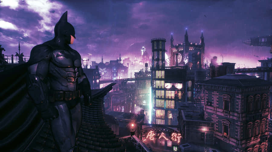 An Illuminated Batman City Skyline As Night Falls Wallpaper