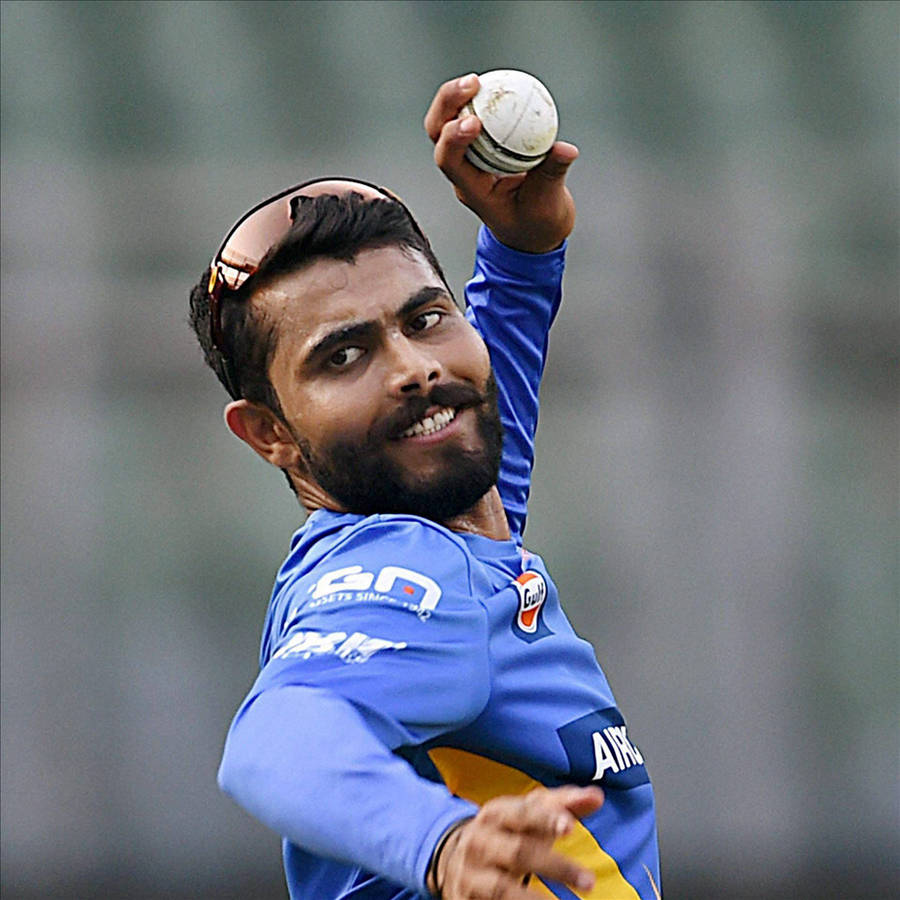 An Intense Moment Of Ravindra Jadeja In Action Wallpaper