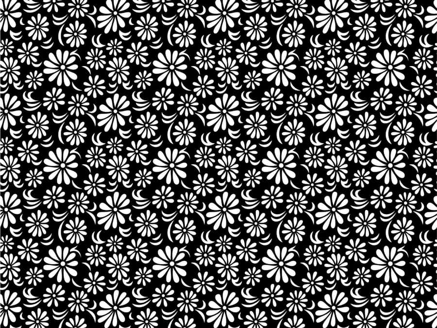 An Intricate Black And White Pattern Of Shapes And Symbols Wallpaper