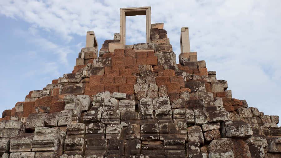 Angkor Thom Ruins Reaching Towards Sky Wallpaper