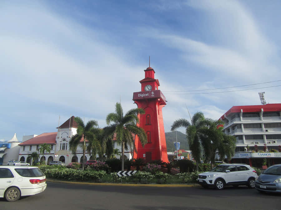 Apia Town Clock Tower Standing Tall On A Gloomy Day Wallpaper
