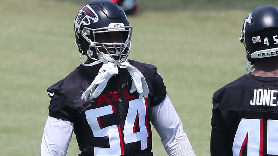 Atlanta Falcons Foyesade Oluokun And Julio Jones Wallpaper