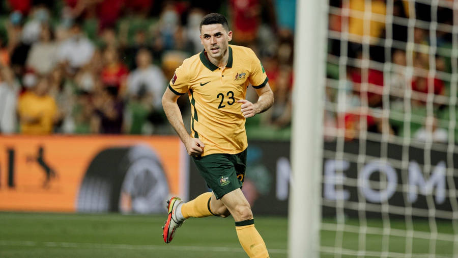 Australia National Football Team Tom Rogic In Action Wallpaper