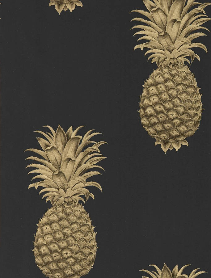 Bask In The Sweetness Of Pineapples Set Against A Backdrop Of Black Wallpaper