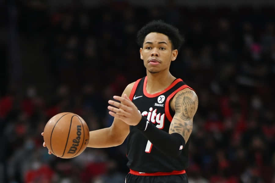 Basketball Playerin Action Dribbling Wallpaper