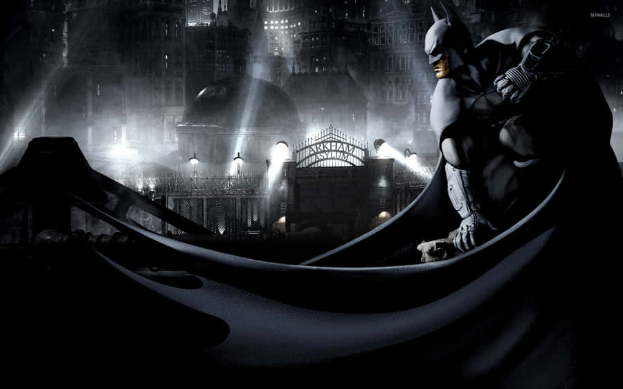 Batman Brooding Over Arkham City Wallpaper