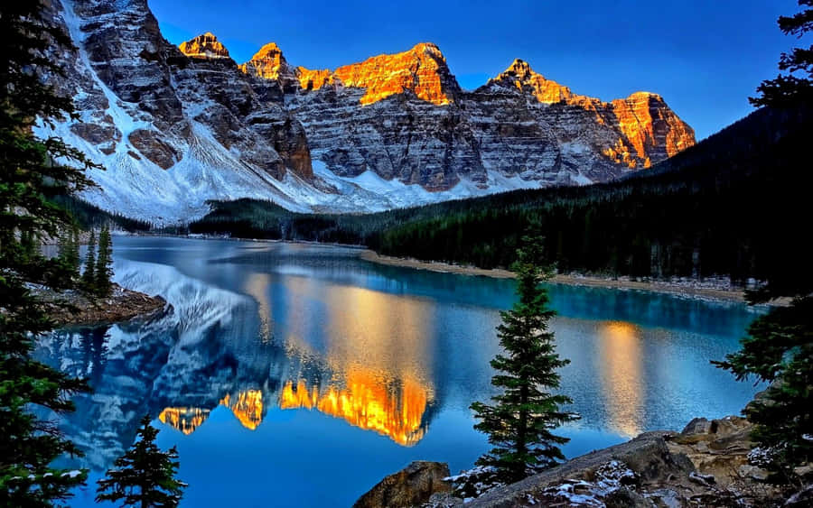 Beautiful Lake Moraine On Sunset Wallpaper