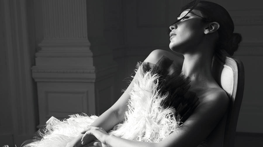 Bella Hadid In Feathery Dress Wallpaper