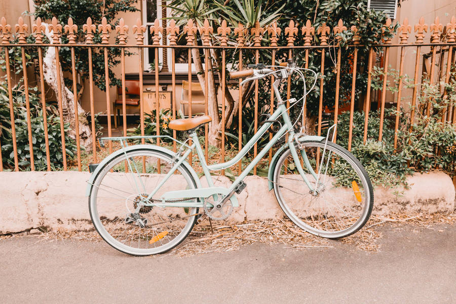 Bike With Pastel Orange Aesthetic Fence Wallpaper