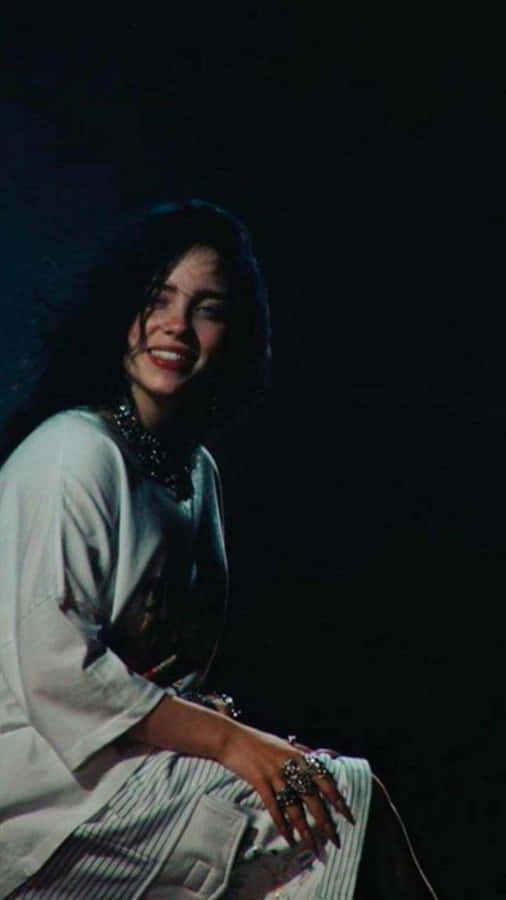 Billie Eilish Radiates Contagious Joy With Her Smile Wallpaper