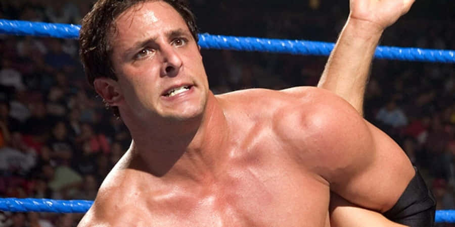 Billy Kidman In The Midst Of A Wwe Fight Wallpaper