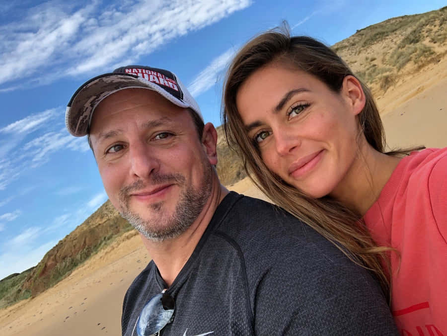 Billy Kidman Posing With Xenia Alexander At A 2022 Event Wallpaper