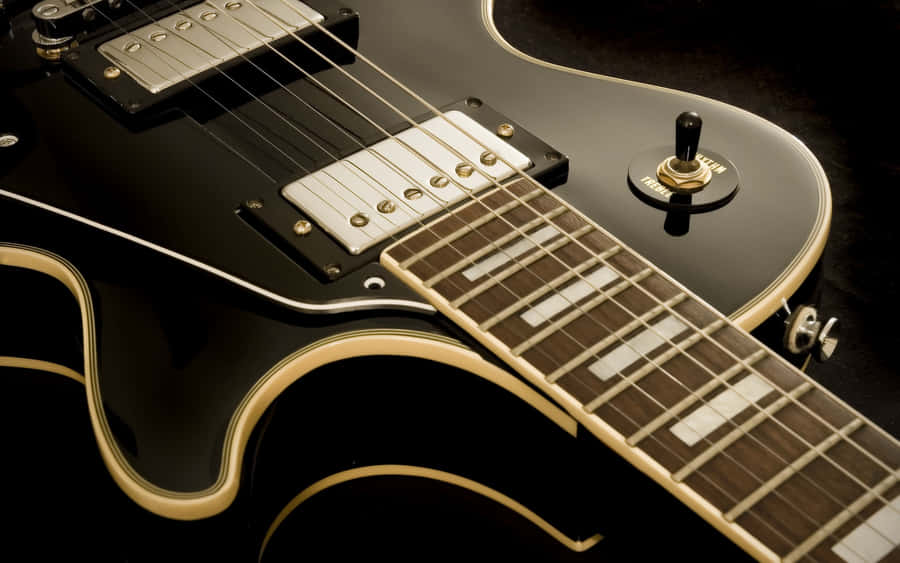 Black Electric Guitar Closeup Wallpaper