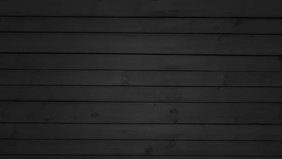 Black Wood Background With A Wooden Plank Wallpaper