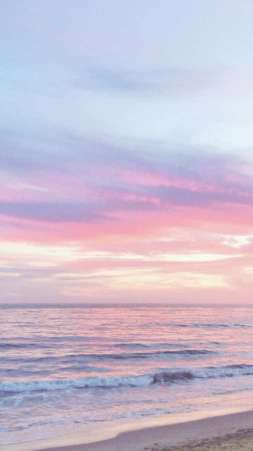 Blissful Paradise - A Picturesque Pastel Beach Awaits Wallpaper
