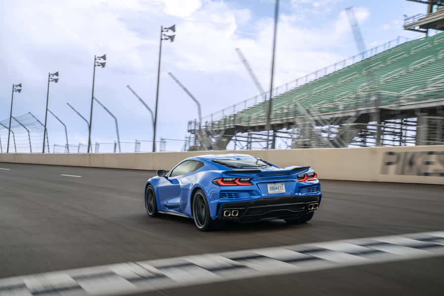 Blue_ Corvette_ C8_ Racing_ On_ Track.jpg Wallpaper