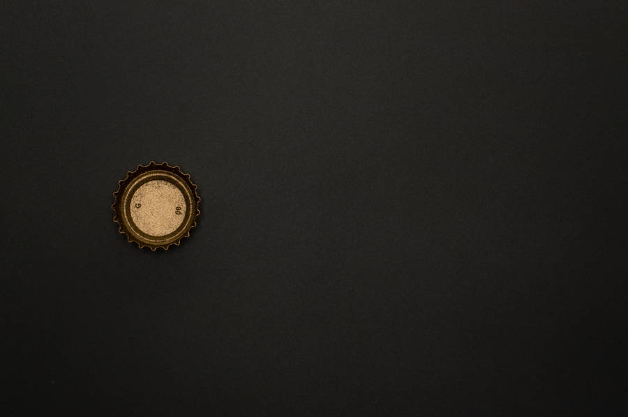 Bottle Cap Black And Gold Iphone Wallpaper