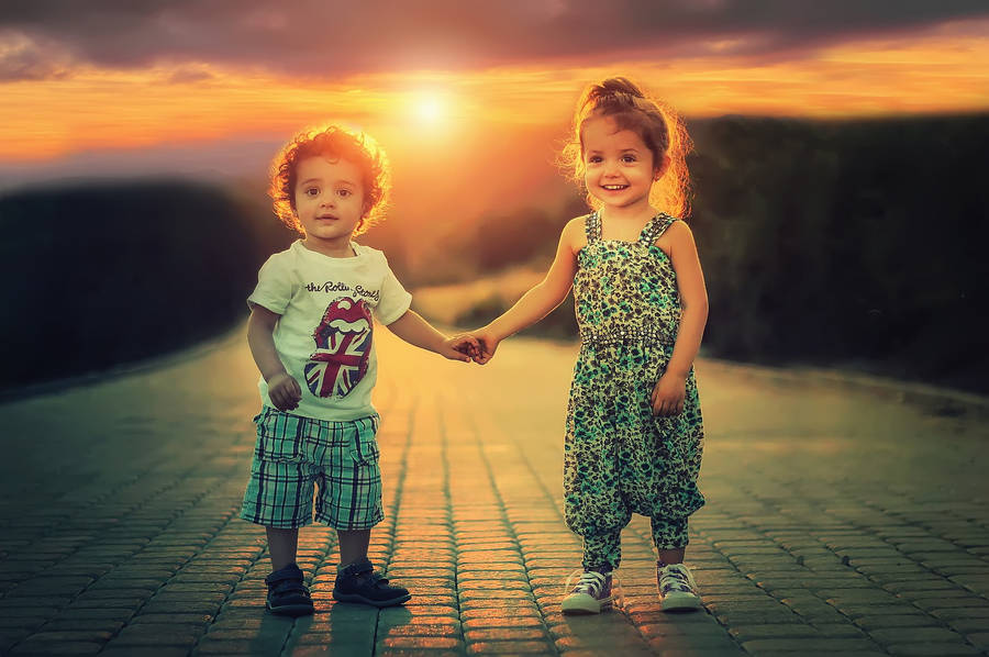 Boy Holds Hand Sister Wallpaper