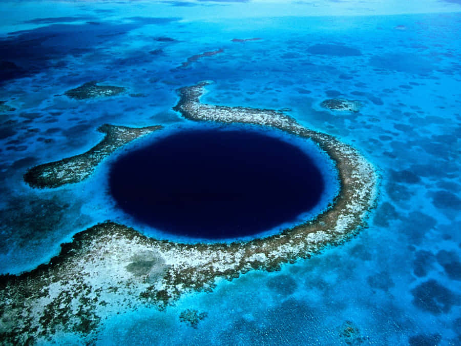 Breathtaking View Of The Great Blue Hole, Belize Wallpaper