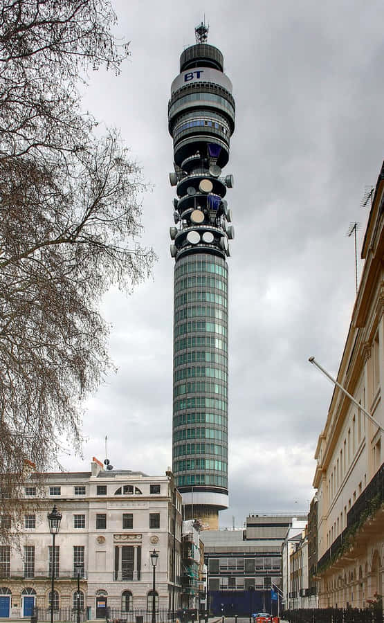 Breathtaking View Of The Iconic Bt Tower Enveloped In A Silver-grey Skyline Wallpaper