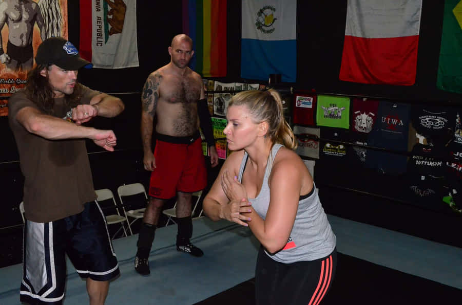 Brian Kendrick - A Master Of Pro-wrestling Training In His Wrestling School. Wallpaper