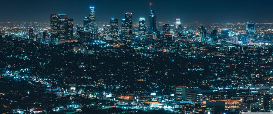 Bright Cityscape In An Ultrawide View Wallpaper