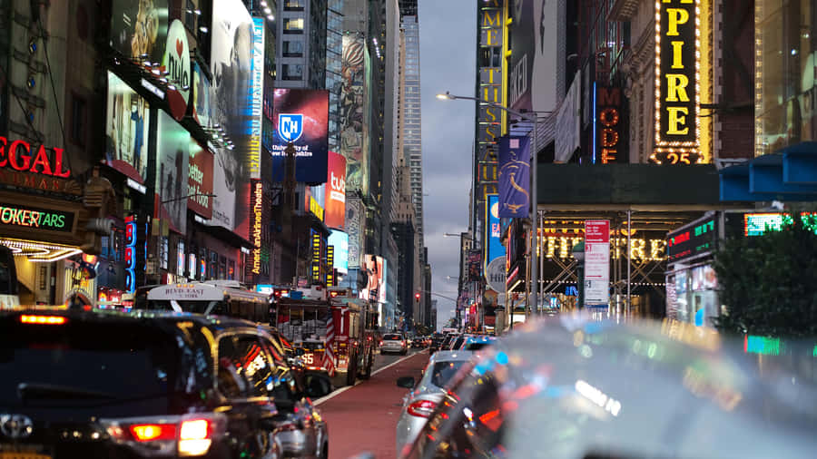 Bright Lights And Endless Energy In The Heart Of New York City - Times Square Wallpaper