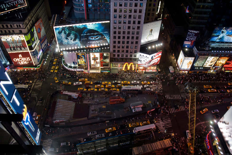 Bright Lights, Big City - Explore The Sparkling Sights Of Times Square Wallpaper