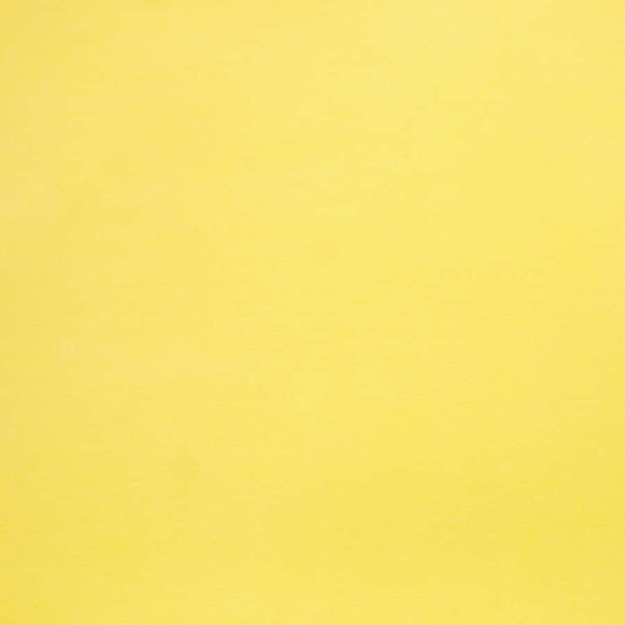 Brighten Your Day With A Vibrant Solid Yellow Wallpaper