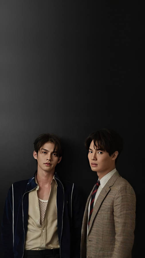 Brightwin Duo Dressed In Formal Attire Wallpaper