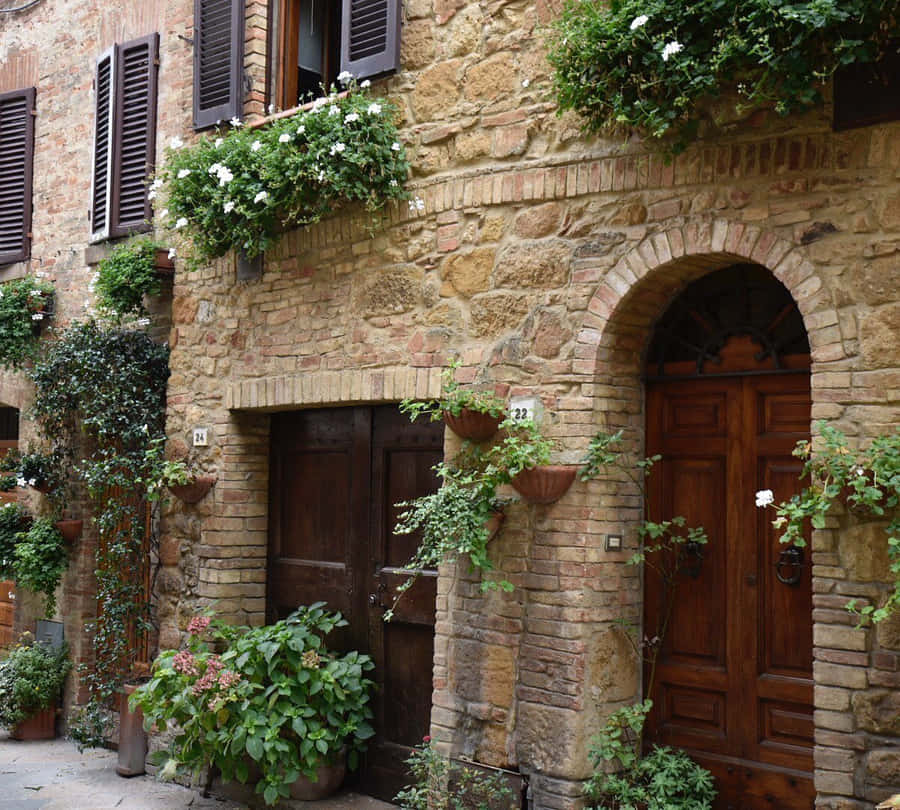 Brown Bricked Vintage Pienza Houses Wallpaper